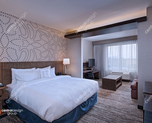 Hotel Bedroom Design with Sleek White Bedding